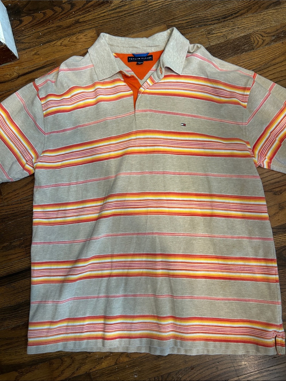 Tommy Hilfiger Beige Polo with Orange and Red Stripe Accents